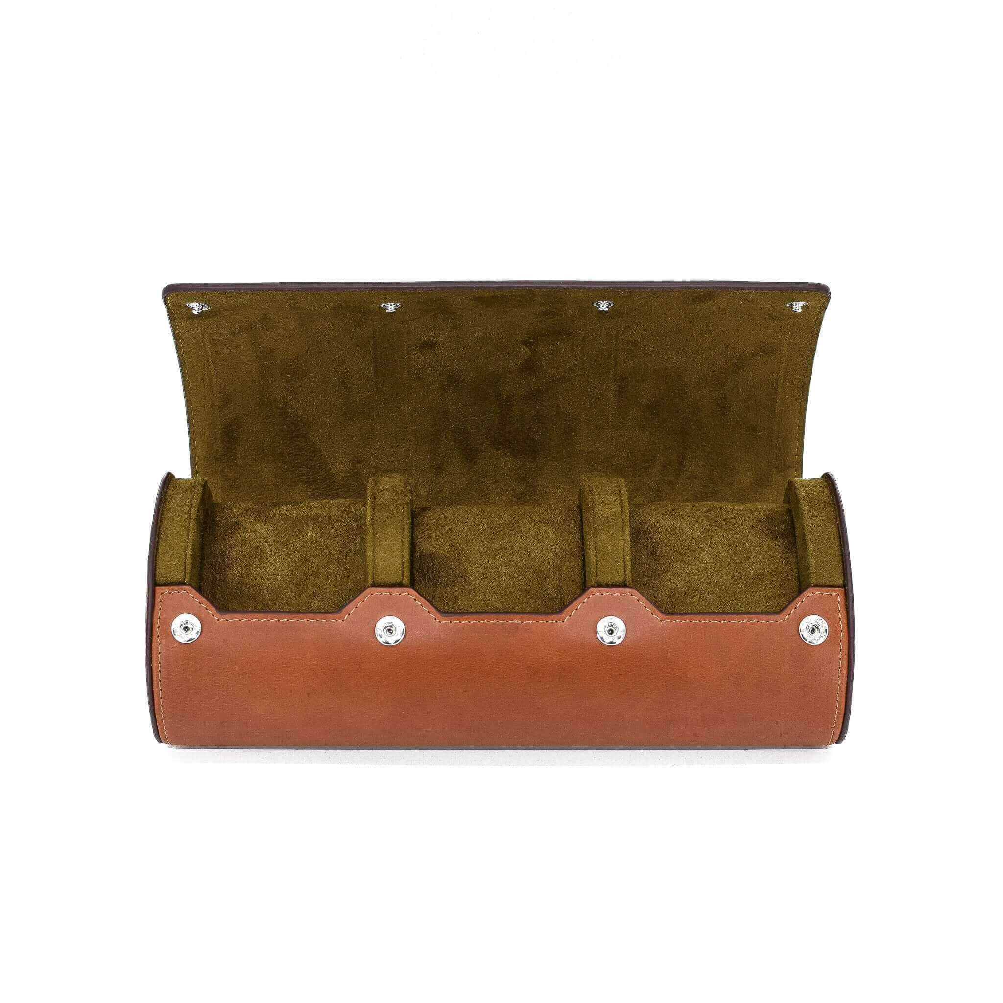 A front view showing the inside of Luxury Watch Roll's triple slot, vintage brown leather watch roll for three watch storage.